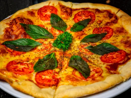 Fresh pizza at a beachfront dining spot in Koh Samui