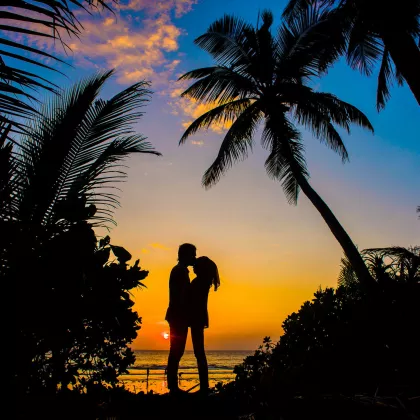Couple by the beach at t Centara Grand Beach Resort & Villas Hua Hin